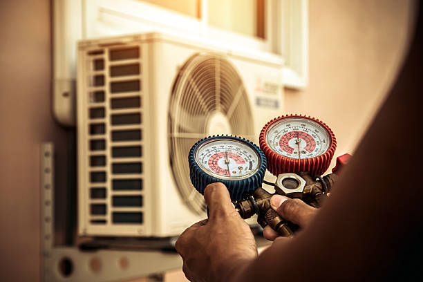 Professional Heat Pump Repair technician working in Harvard, MA